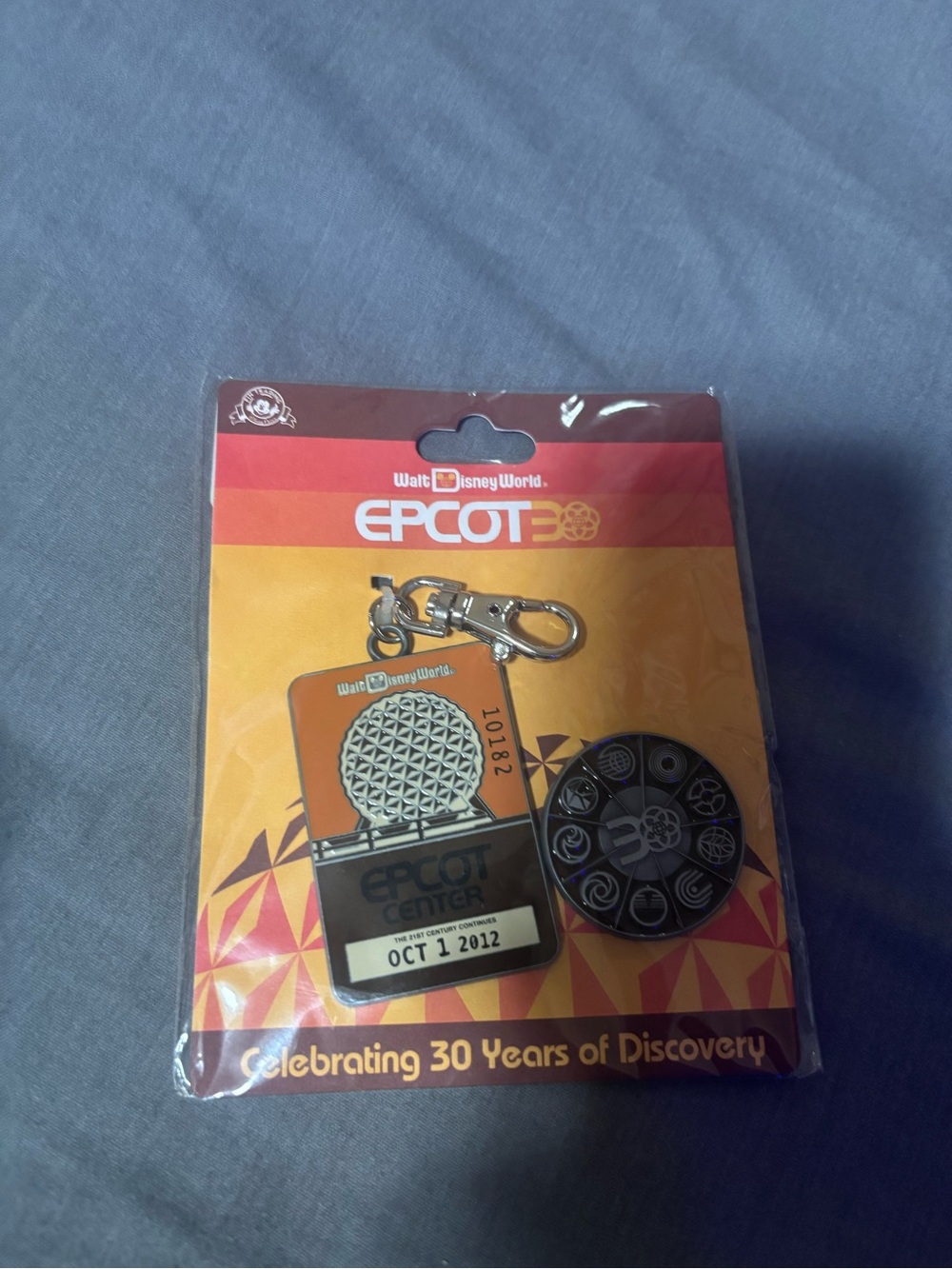 Disney EPCOT Orange and Black Keychain & Pin Set